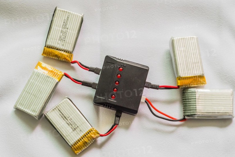 A USB hub connected to multiple lithium polymer batteries for charging, in South Korea