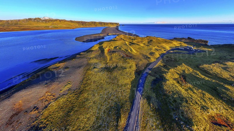 Dyrholaos lagoon in the evening light, drone shot, Sudurland, Iceland, Europe