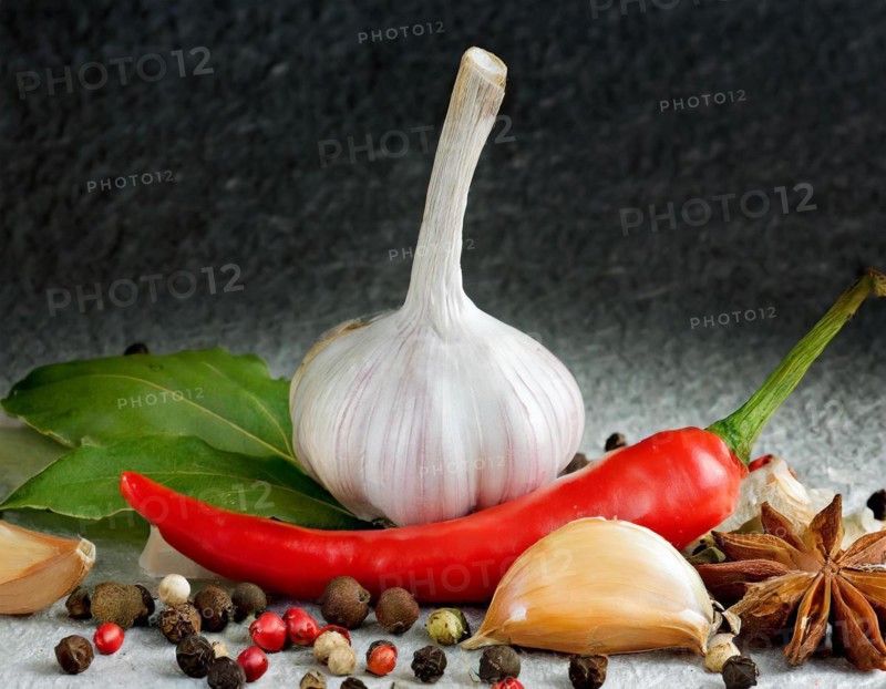 Fresh garlic arranged with red chilli, colourful peppercorns and green herbs, AI generated, AI generated