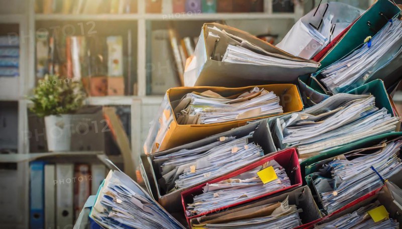 Overflowing filing boxes with lots of papers and folders in one room, bureaucracy symbol, AI generated, AI generated