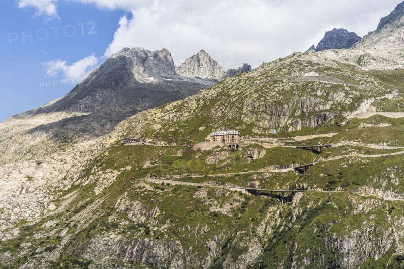 View of the serpentines of the Furka Pass road and the famous Hotel Belvedere, Obergoms, Canton Valais, Switzerland, Europe