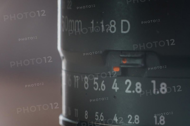 Close up detailed shot of a prime lens 50mm f1.8g in soft natural light