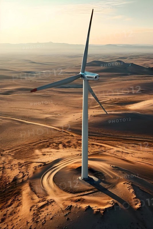 Wind turbine standing idle in a still lifeless desert representing the challenges of transition, AI generated