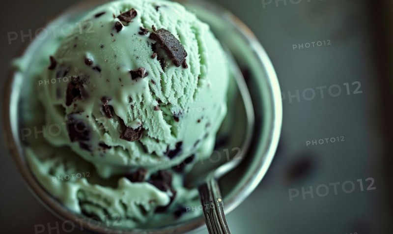 Mint chocolate chip ice cream scoop, closeup AI generated