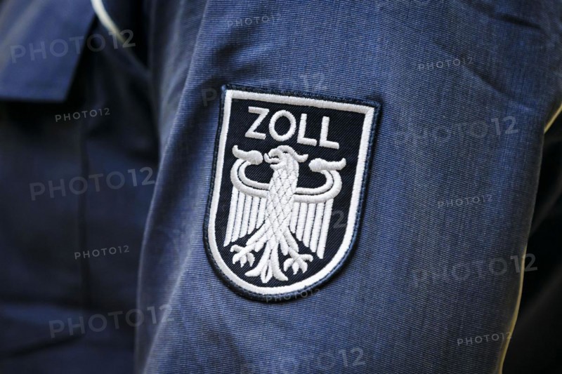 Customs logo on the shirt of a customs officer. Berlin, 03.04.2024