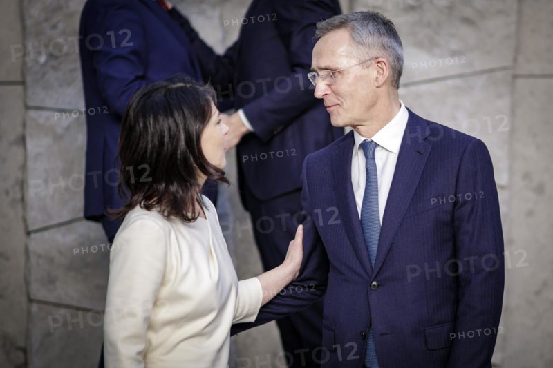 (L-R) Annalena Baerbock, Federal Foreign Minister, in conversation with Jens Stoltenberg, NATO Secretary General, at the family photo during the meeting of NATO foreign ministers. Brussels, 03.04.2024. Photographed on behalf of the Federal Foreign Office