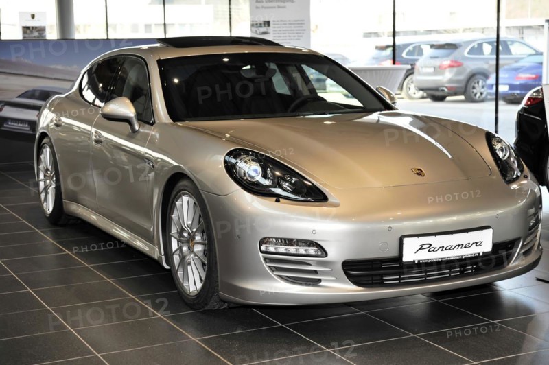 Silver Porsche Panamera in a showroom of a car dealership, Schwaebisch Gmuend, Baden-Wuerttemberg, Germany, Europe