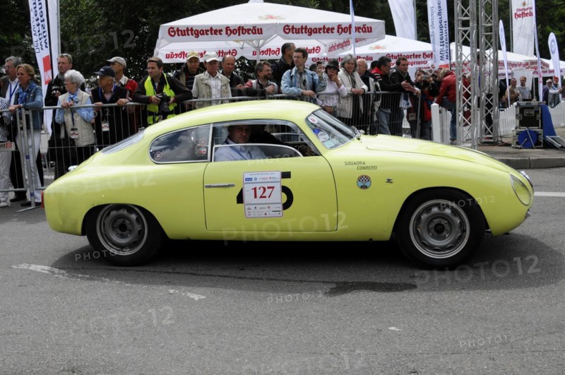 A yellow classic racing car with starting number 127 drives past spectators, SOLITUDE REVIVAL 2011, Stuttgart, Baden-Wuerttemberg, Germany, Europe