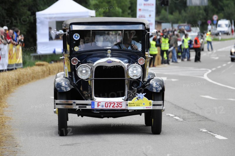 Ford Model A, year of construction 1929, A black Ford Cabriolet vintage car drives in a race with spectators in the background, SOLITUDE REVIVAL 2011, Stuttgart, Baden-Wuerttemberg, Germany, Europe