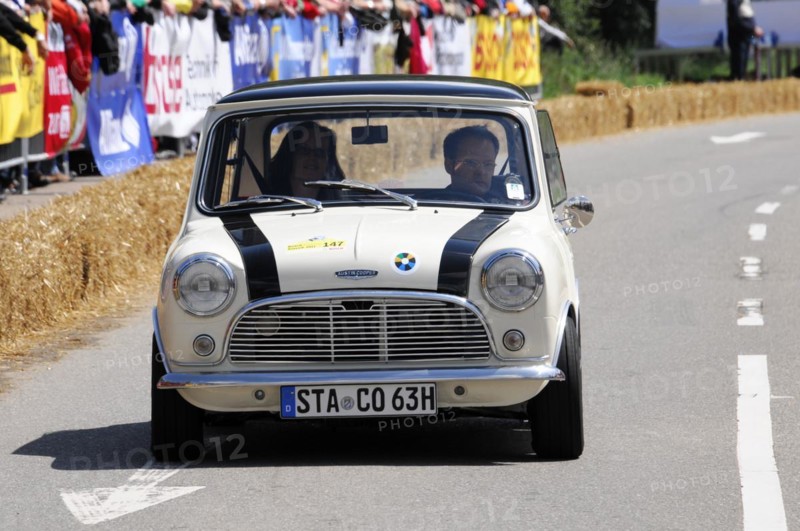 A white Mini Cooper takes part in a classic car race, SOLITUDE REVIVAL 2011, Stuttgart, Baden-Wuerttemberg, Germany, Europe