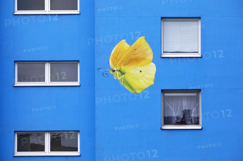 Sunflower house, painted yellow lemon butterfly on a skyscraper, artist Ulrich Allgaier, Wuppertal, North Rhine-Westphalia, Germany, Europe