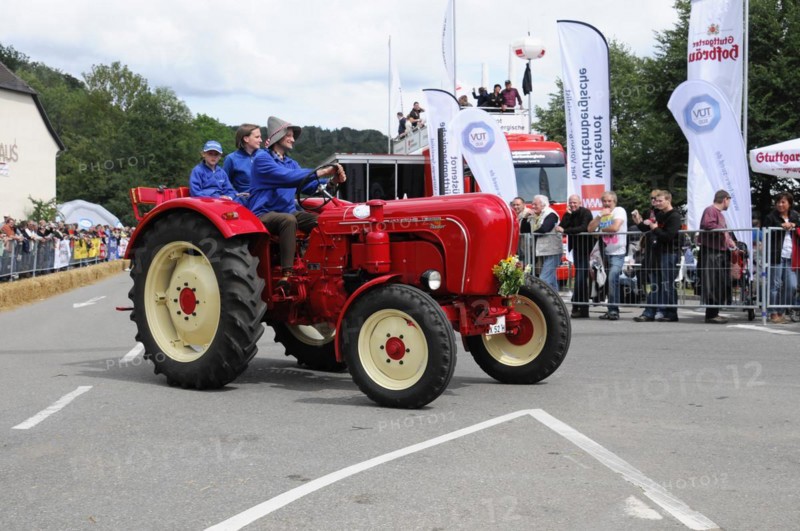 Porsche Diesel Tractors, A historic red tractor is proudly driven in a summer parade, SOLITUDE REVIVAL 2011, Stuttgart, Baden-Wuerttemberg, Germany, Europe