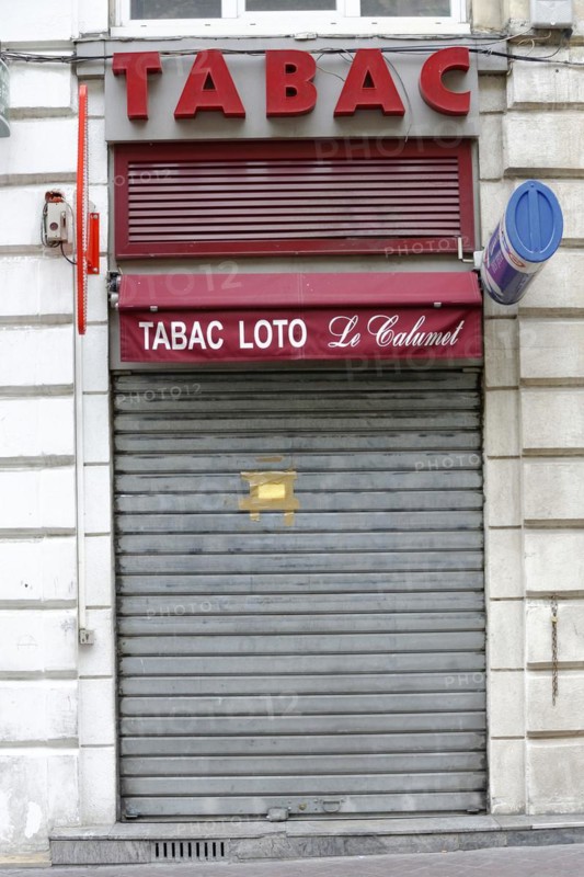 Marseille, Closed tobacco shop with red awning and golden letters, Marseille, Departement Bouches-du-Rhone, Region Provence-Alpes-Cote d'Azur, France, Europe