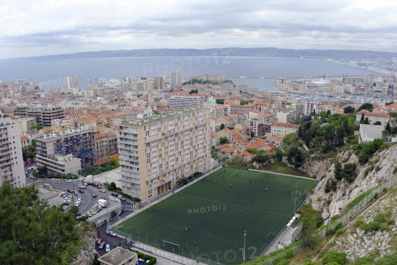 Marseille, panoramic view of a city with harbour, football pitch and high-rise buildings by the sea, Marseille, Departement Bouches-du-Rhone, Region Provence-Alpes-Cote d'Azur, France, Europe