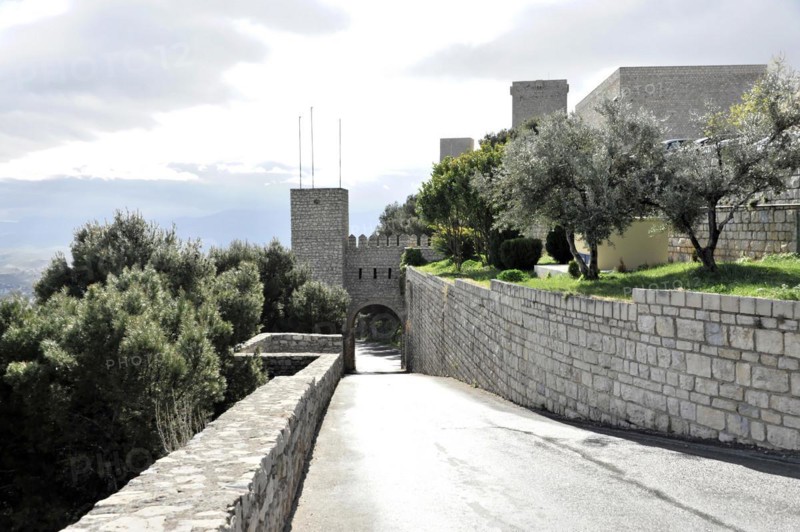 Path to the Gothic castle Castillo de Santa Catalina, Jaen, Jaen province, stone fortress with tower and wall along a cobbled path, Granada, Andalusia, Spain, Europe