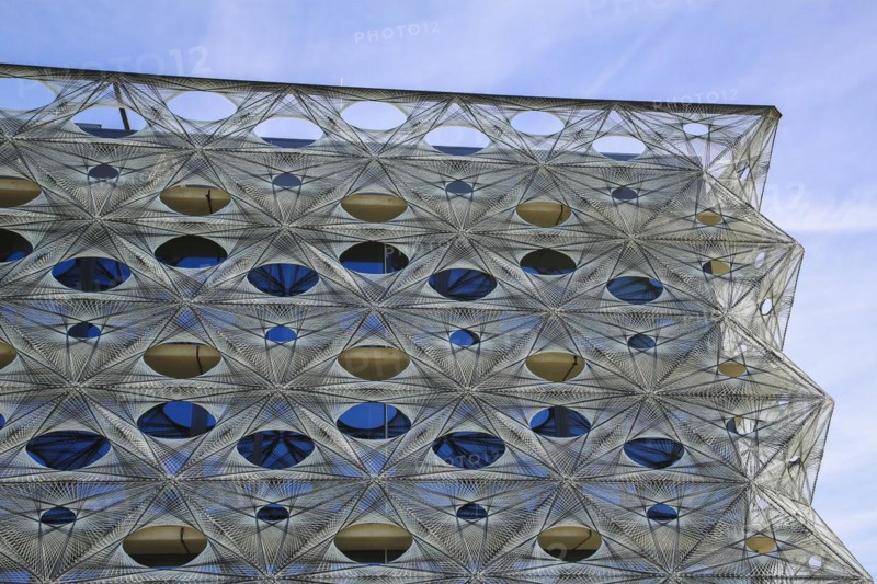 Reutlingen University, Reutlingen University, Texoversum, German University Building Award 2024 for TEXOVERSUM, modern architecture, facade made of carbon and glass fibres, mesh, innovative, identity-creating, unique facade, campus, place of learning, special, extraordinary new building for textile courses, light, airy, airy, holes, detail, architectural eye-catcher, Reutlingen, Baden-Wuerttemberg, Germany, Europe