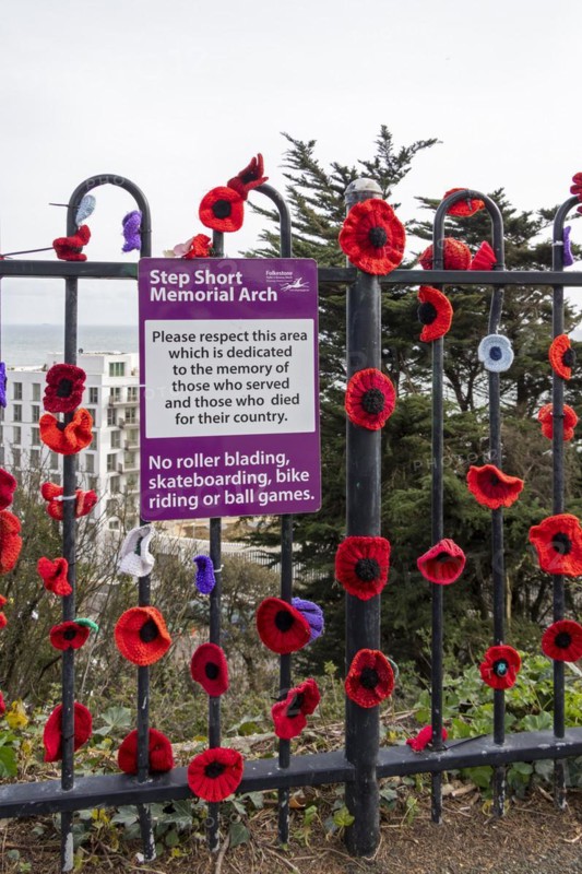 Sign, crocheted flowers, Road of Remembrance, Folkestone, Kent, Great Britain