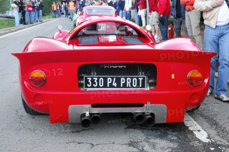 Rear view of a red super sports car on a race track with spectators, SOLITUDE REVIVAL 2011, Stuttgart, Baden-Wuerttemberg, Germany, Europe