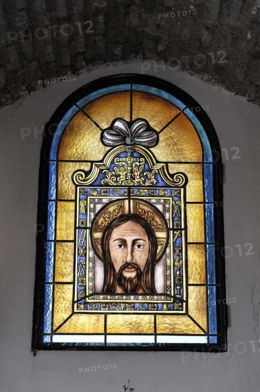 Castillo de Santa Catalina in Jaen, artistic stained glass window with a portrait of Jesus, Granada, Andalusia, Spain, Europe