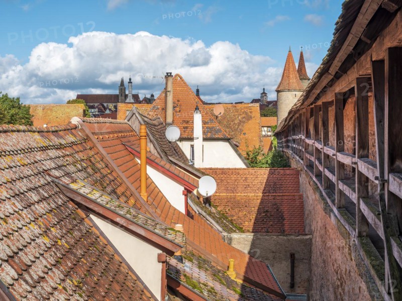 View from the battlements of the town wall to the houses and towers of the historic old town, Rothenburg ob der Tauber, Middle Franconia, Bavaria, Germany, Europe