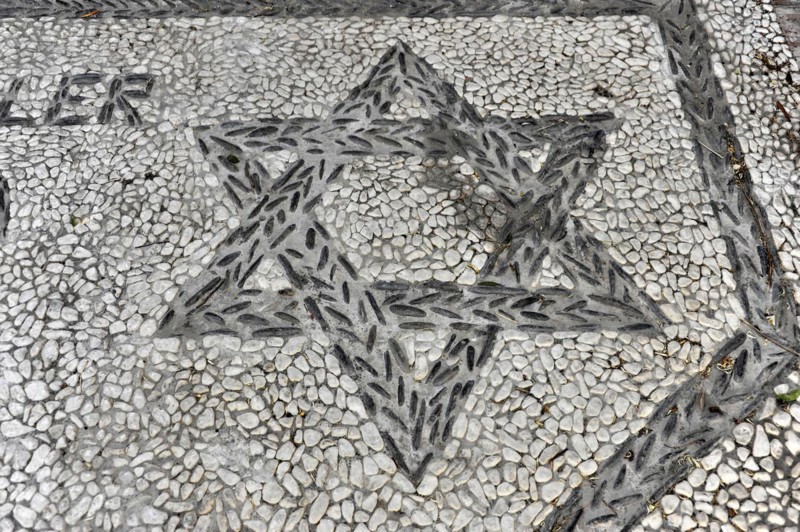 Solabrena, Creative star mosaic design embedded in a pebble pavement, Costa del Sol, Andalusia, Spain, Europe