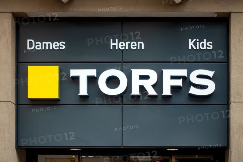 Shoe shop sign with logo of the Flemish chain store Schoenen Torfs in Flanders, Belgium, Europe