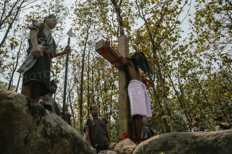 Christian devotees takes part in a perform to re-enactment of the crucifixion of Jesus Christ during a procession on Good Friday, on March 29, 2024 in Guwahati, Assam, India. Good Friday is a Christian holiday commemorating the crucifixion of Jesus Christ and his death at Calvary