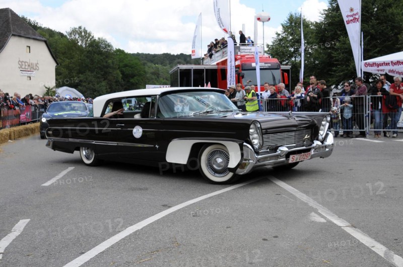 Black and white luxury convertible classic car in front of a group of spectators, SOLITUDE REVIVAL 2011, Stuttgart, Baden-Wuerttemberg, Germany, Europe