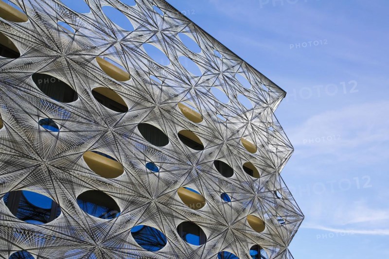 Reutlingen University, Reutlingen University, Texoversum, German University Building Award 2024 for TEXOVERSUM, modern architecture, facade made of carbon and glass fibres, mesh, innovative, identity-creating, unique facade, campus, place of learning, special, extraordinary new building for textile courses, light, airy, airy, holes, detail, architectural eye-catcher, Reutlingen, Baden-Wuerttemberg, Germany, Europe