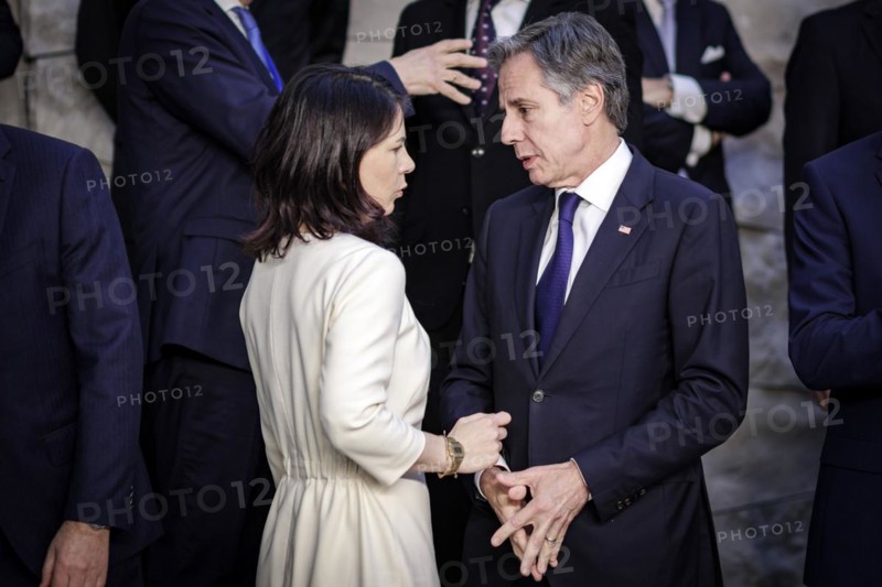 (L-R) Annalena Baerbock, Federal Foreign Minister, in conversation with Antony Blinken, Secretary of State of the United States of America, at the family photo during the meeting of NATO foreign ministers. Brussels, 03.04.2024. Photographed on behalf of the Federal Foreign Office