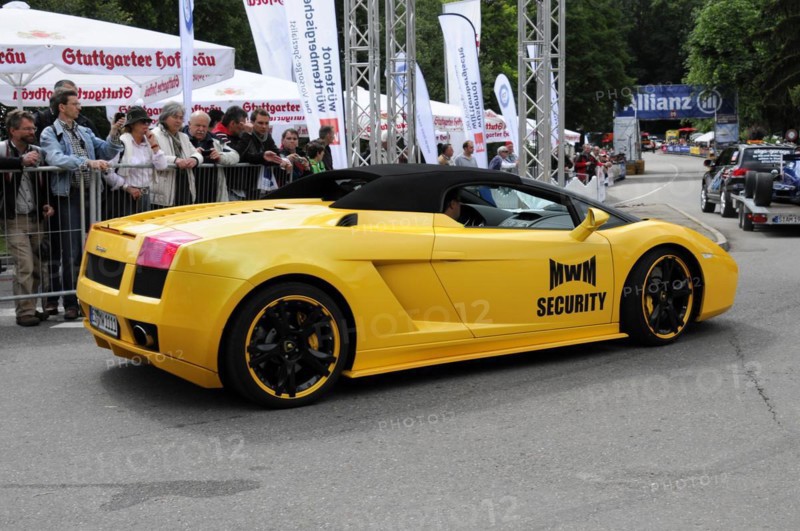 Side view of a yellow Lamborghini sports car with sponsor stickers at a race, SOLITUDE REVIVAL 2011, Stuttgart, Baden-Wuerttemberg, Germany, Europe