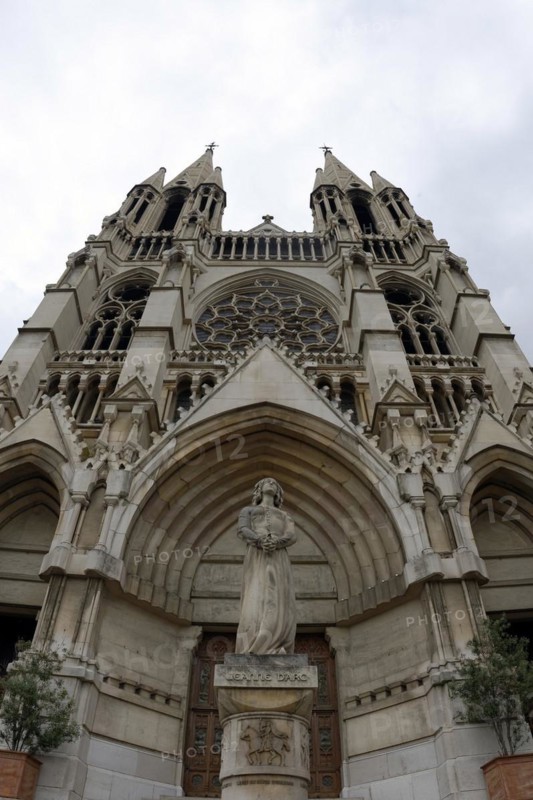 Church of Saint-Vincent-de-Paul, Detailed front view of a Gothic-style church facade with central statue, Marseille, Departement Bouches-du-Rhone, Provence-Alpes-Cote d'Azur region, France, Europe