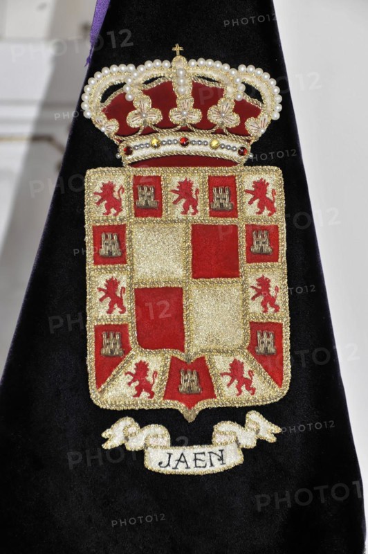 Castillo de Santa Catalina on Jaen, Detailed embroidery of a coat of arms with golden decoration on a velvety fabric, Granada, Andalusia, Spain, Europe