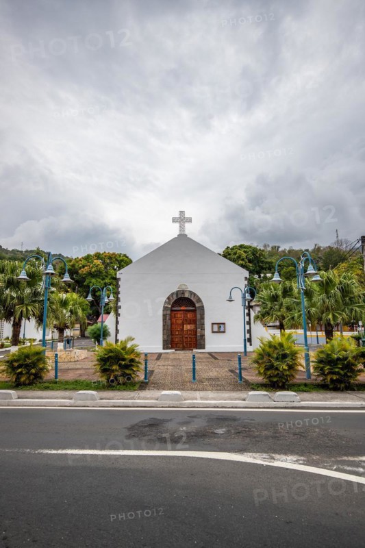 Deshaies, historic Caribbean wooden building of a street in Guadeloupe, Caribbean, French Antilles