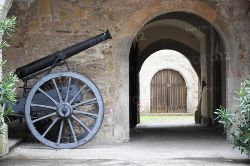 Langenburg Castle, An old cannon in front of a passageway in a historic building, Langenburg Castle, Langenburg, Baden-Wuerttemberg, Germany, Europe