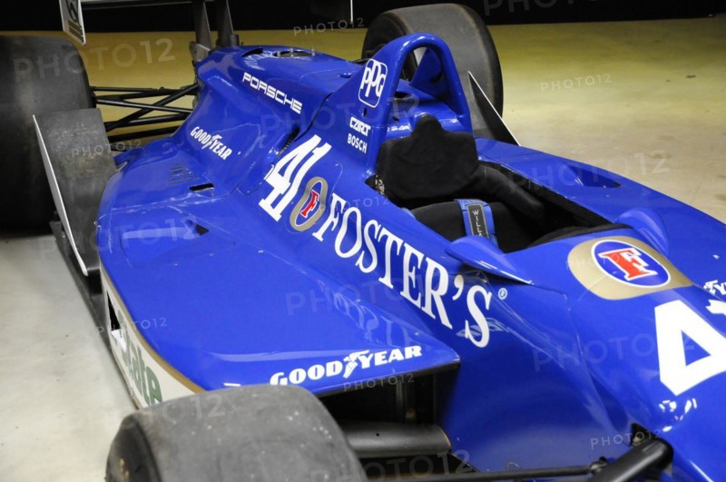 Deutsches Automuseum Langenburg, A blue Formula 1 car with Porsche and Foster's advertising in an exhibition centre, Deutsches Automuseum Langenburg, Langenburg, Baden-Wuerttemberg, Germany, Europe