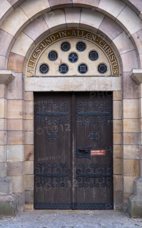 Slogan All and in all Christ above a door of St Mary's Cathedral, Havelberg, Saxony-Anhalt, Germany, Europe