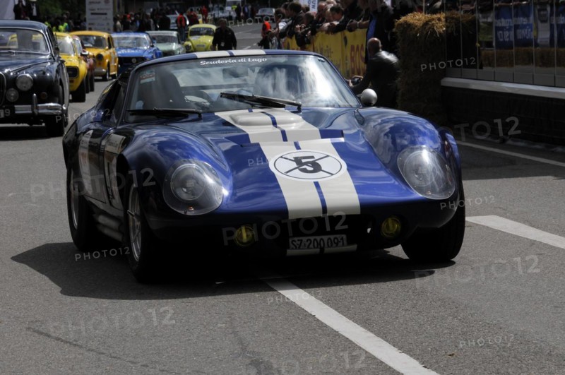 Blue racing car with white stripe and start number driving in front of spectators on a street, SOLITUDE REVIVAL 2011, Stuttgart, Baden-Wuerttemberg, Germany, Europe
