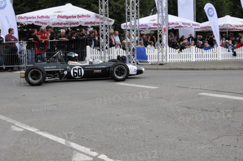 A classic black formula racing car with number 60 surrounded by spectators, SOLITUDE REVIVAL 2011, Stuttgart, Baden-Wuerttemberg, Germany, Europe