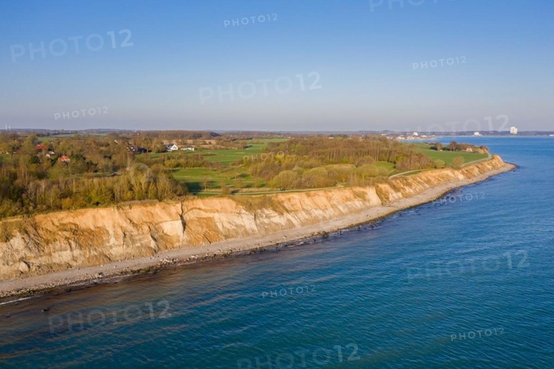 Aerial view over beach and Brodtener Ufer, Brodten Steilufer, cliff in the Bay of Luebeck along the Baltic Sea at sunrise, Schleswig-Holstein, Germany, Europe