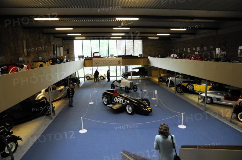 Deutsches Automuseum Langenburg, View over the upper level of a car museum with classic cars on display and visitors, Deutsches Automuseum Langenburg, Langenburg, Baden-Wuerttemberg, Germany, Europe