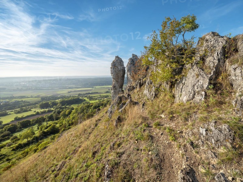 Wiesenthauer Nadel rock formation on the Ehrenbuerg witness mountain, also known as Walberla, Veldensteiner Forst nature park Park, Forchheim, Upper Franconia, Franconian Switzerland, Bavaria, Germany, Europe