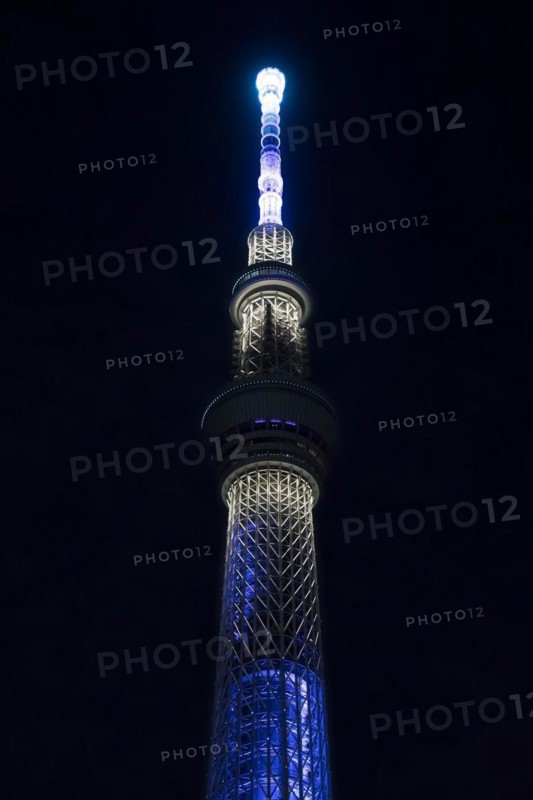 634 meters high Tokyo Skytree, broadcasting and observation tower in Sumida illuminated at night in the city Tokyo, Japan, Asia