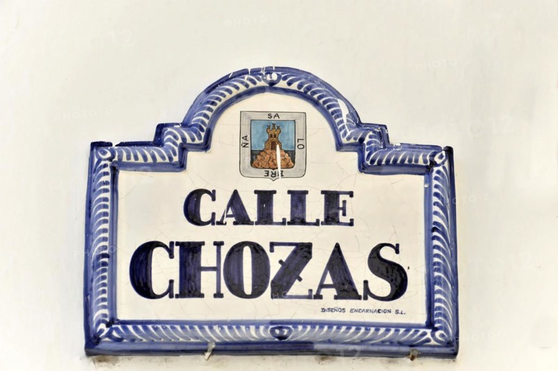 Solabrena, A traditional blue and white ceramic sign shows the street name 'Calle Chozas', Andalusia, Spain, Europe