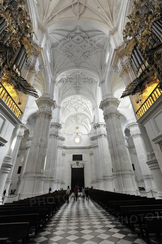 Santa Maria de la Encarnacion, Cathedral of Granada, view through the nave of a cathedral with high vaulted ceiling and chess floor pattern, Granada, Andalusia, Spain, Europe