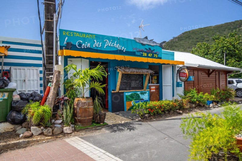 Deshaies, historic Caribbean wooden building of a street in Guadeloupe, Caribbean, French Antilles