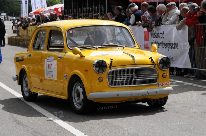 A small yellow car with starting number and accident damage at a classic car race, SOLITUDE REVIVAL 2011, Stuttgart, Baden-Wuerttemberg, Germany, Europe