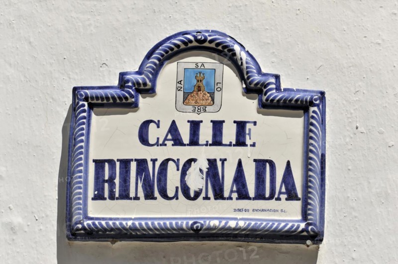 Solabrena, A blue and white ceramic road sign with the inscription 'CALLE RINCONADA', Costa del Sol, Andalusia, Spain, Europe