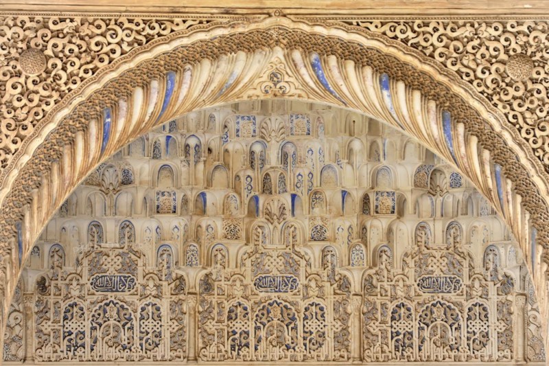 Artistic stone carvings, Alhambra, Granada, A detailed Islamic stone carving with arches and arabesque patterns, Granada, Andalusia, Spain, Europe