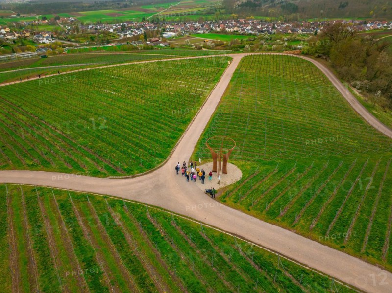Viewpoint with circular structure amidst vineyards and paths in daylight, Jesus Grace Chruch, Weitblickweg, Easter hike, Hohenhaslach, Germany, Europe